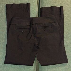 The Limited “Exact Stretch” 4/30” inseam flared  Black pinstripe trousers